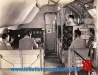 douglas-dc-4e-engineers-working-on-instrument-board.jpg