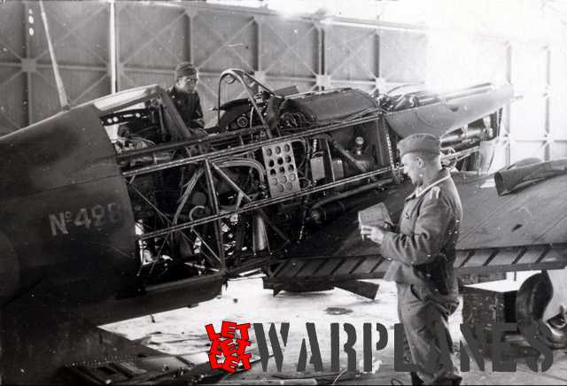 German technicians examine a sample machine captured at Dijon. With panels removed it shows all of the airframe construction and interior content. The M.S. 406C1 is of the tubular frame construction which mean ease of repair and capable battle damage resistance but on the other hand also mean a weight penalty. (Daniel Gilberti)