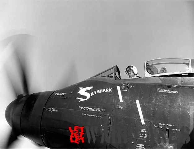 Douglas test pilot 'Doc' Livinston in the cockpit of a production A2D-1. The photo was taken on 19 August 1955. The Skyraider was one of the machines bailed to Allison for engine testing. Most likely it was BuNo. 125484; the last Skyshark to be delivered and flown. The Skyshark figure and name are remarkable.