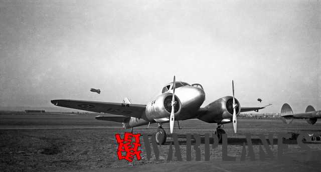 AT-9 at Mines Field. Mines Filed would later become Los Angeles International Airport! Also here, P-38's were present as well as barrage balloons (Mark Nankivil collection)