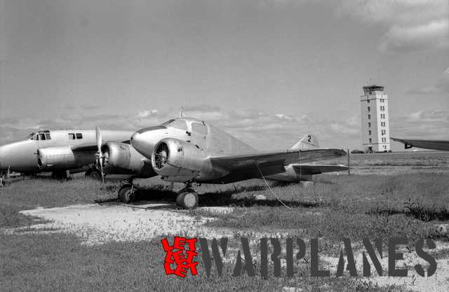 Unidentified AT-9's at Tulsa Oklahoma. This photo was taken on 18 May 1953. The removed propeller served without doubt to prevent unauthorized flying (Mark Nankivil collection)