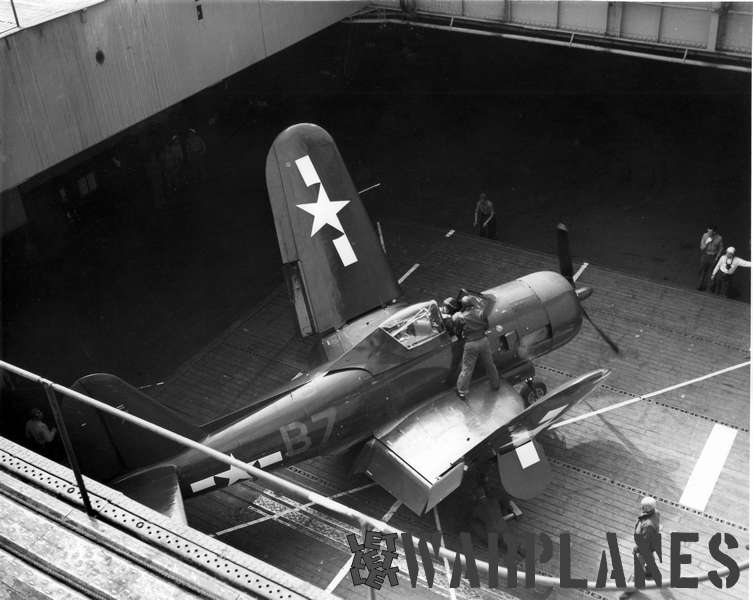 FR-1 'B7' from VF-66 in the hangar lift of aircraft carrier USS Ranger