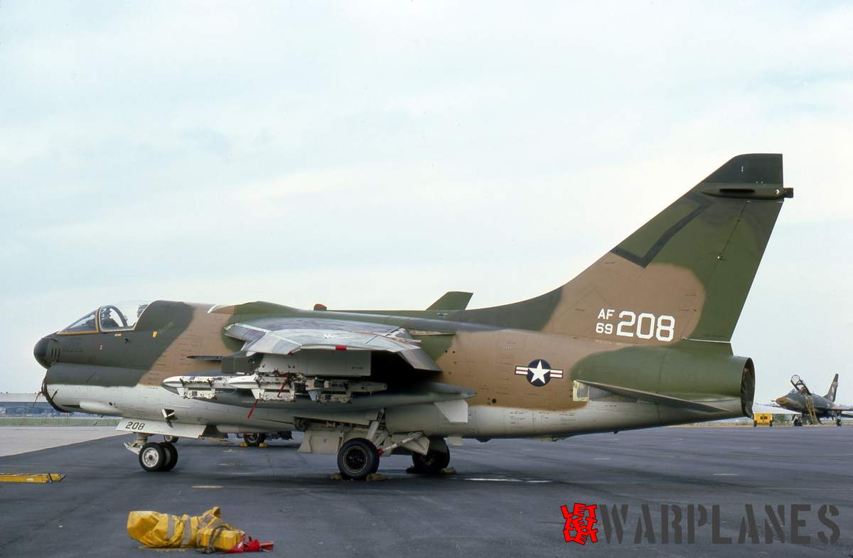 A-7D 69-6208 30th October 1977. Under wing pylon is multiple bomb pylon. It is camouflaged in standard colors adopted during the Vietnam war.